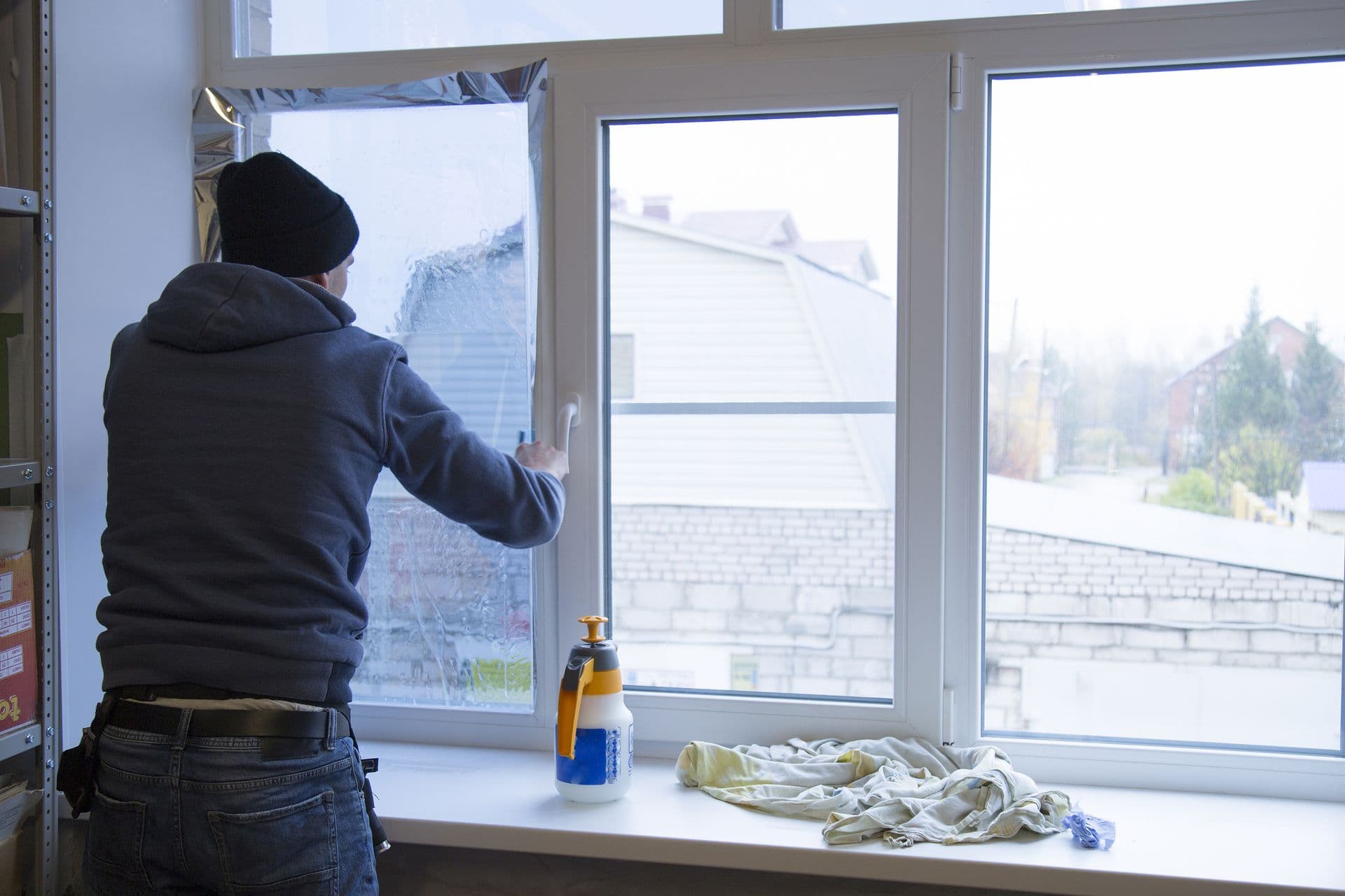 bigstock-Installation-Of-Window-Film-In-337575052.jpg
